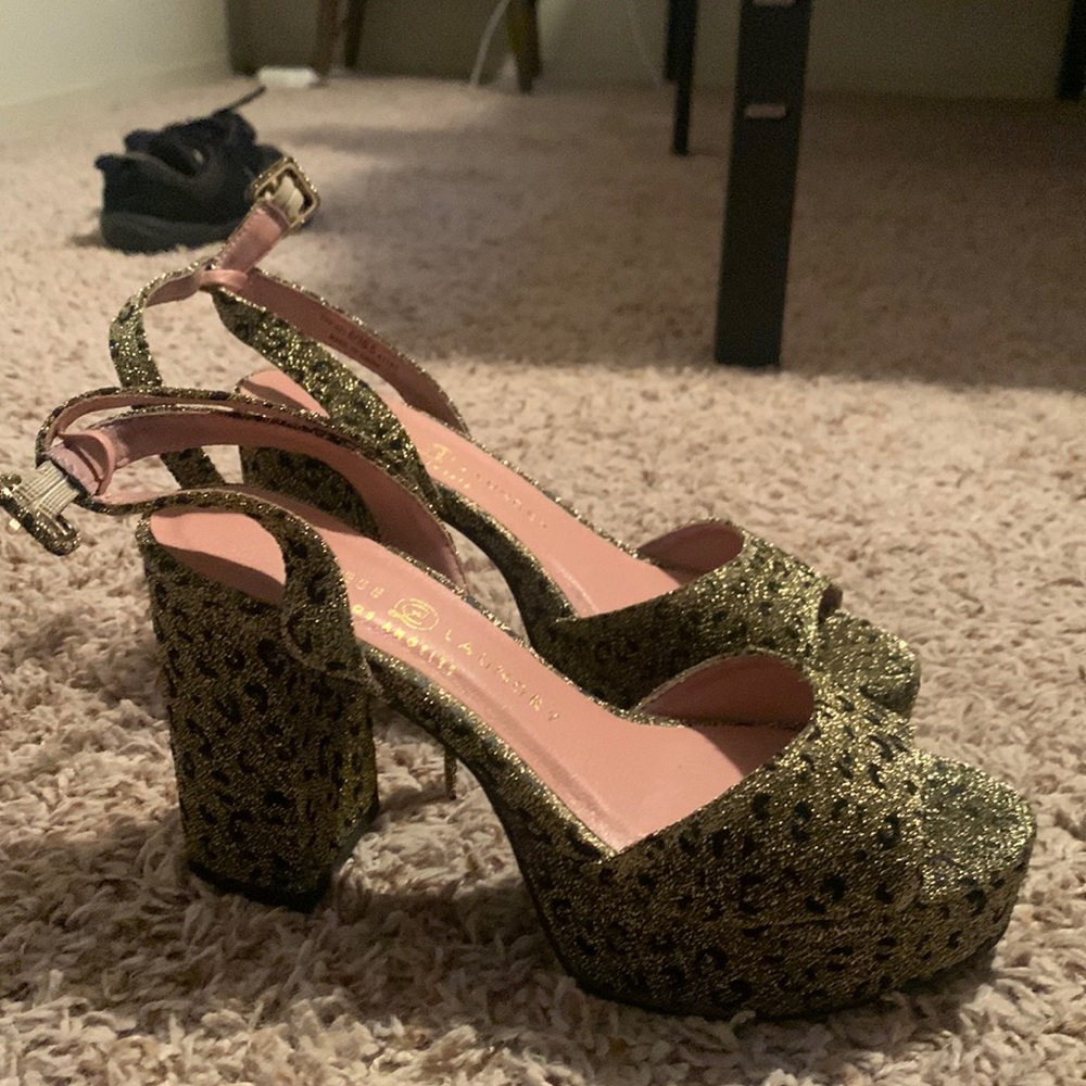 Gold cheers platform heels